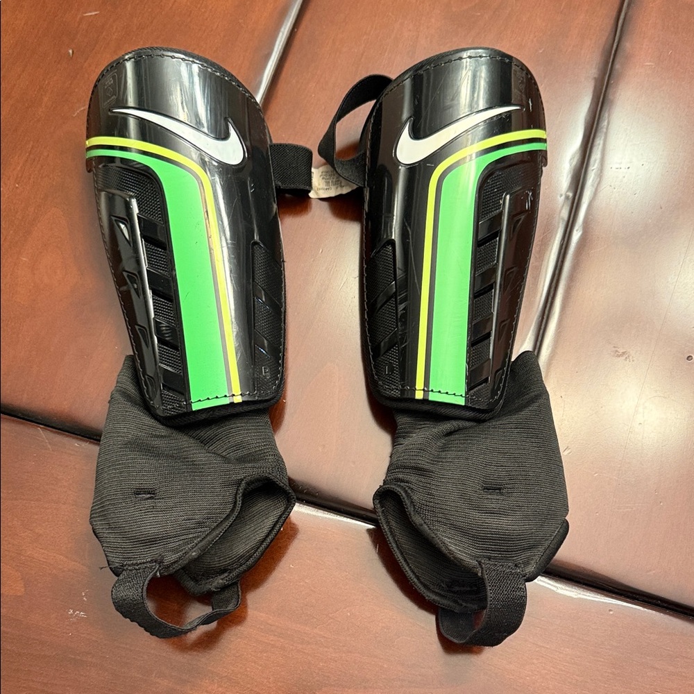 Nike Black and Green Sports Shin Guards